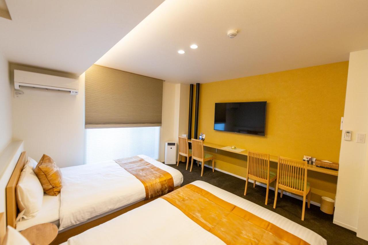 Grand Base Hiroshima Ekimae Aparthotel Buitenkant foto